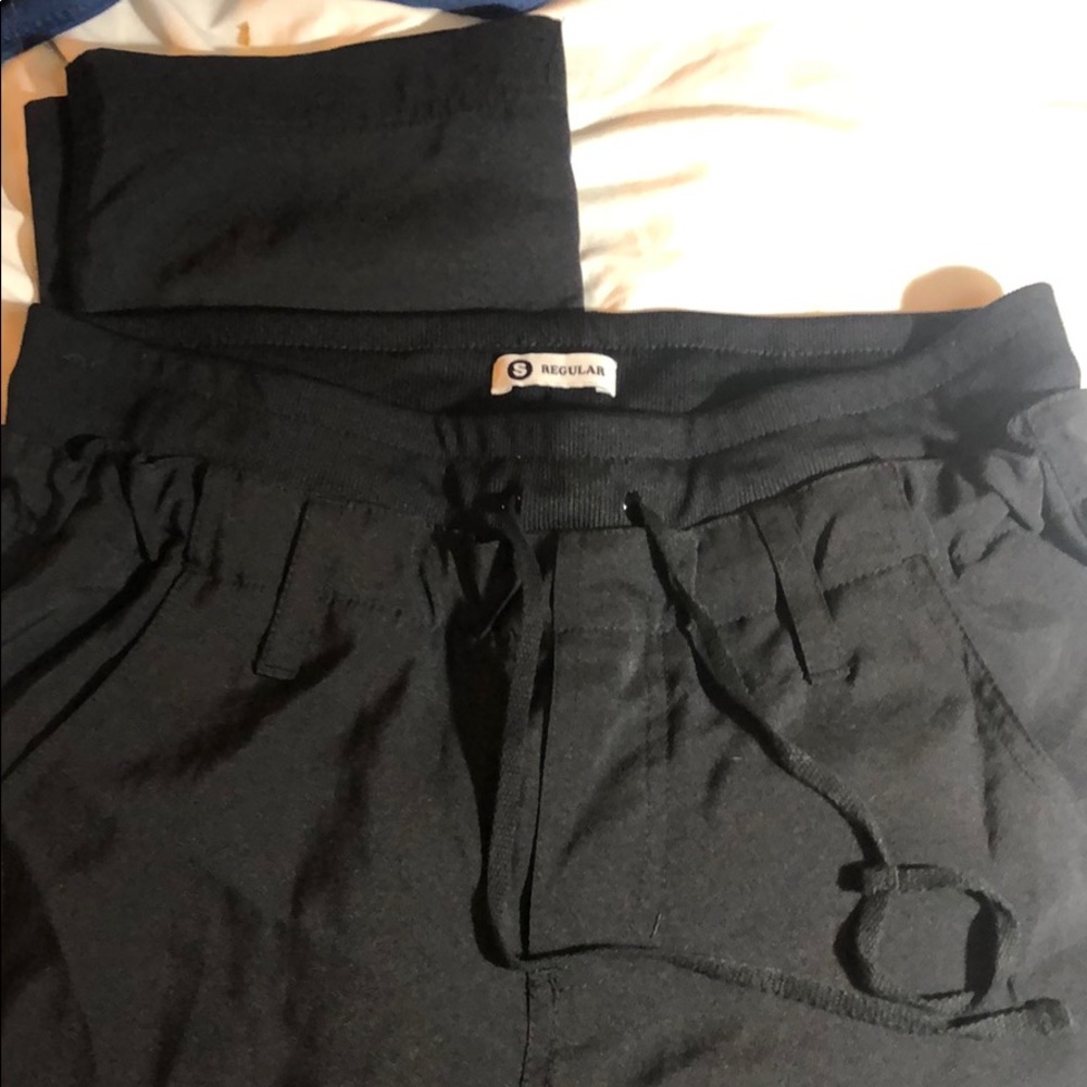 Black koi tech scrub pants